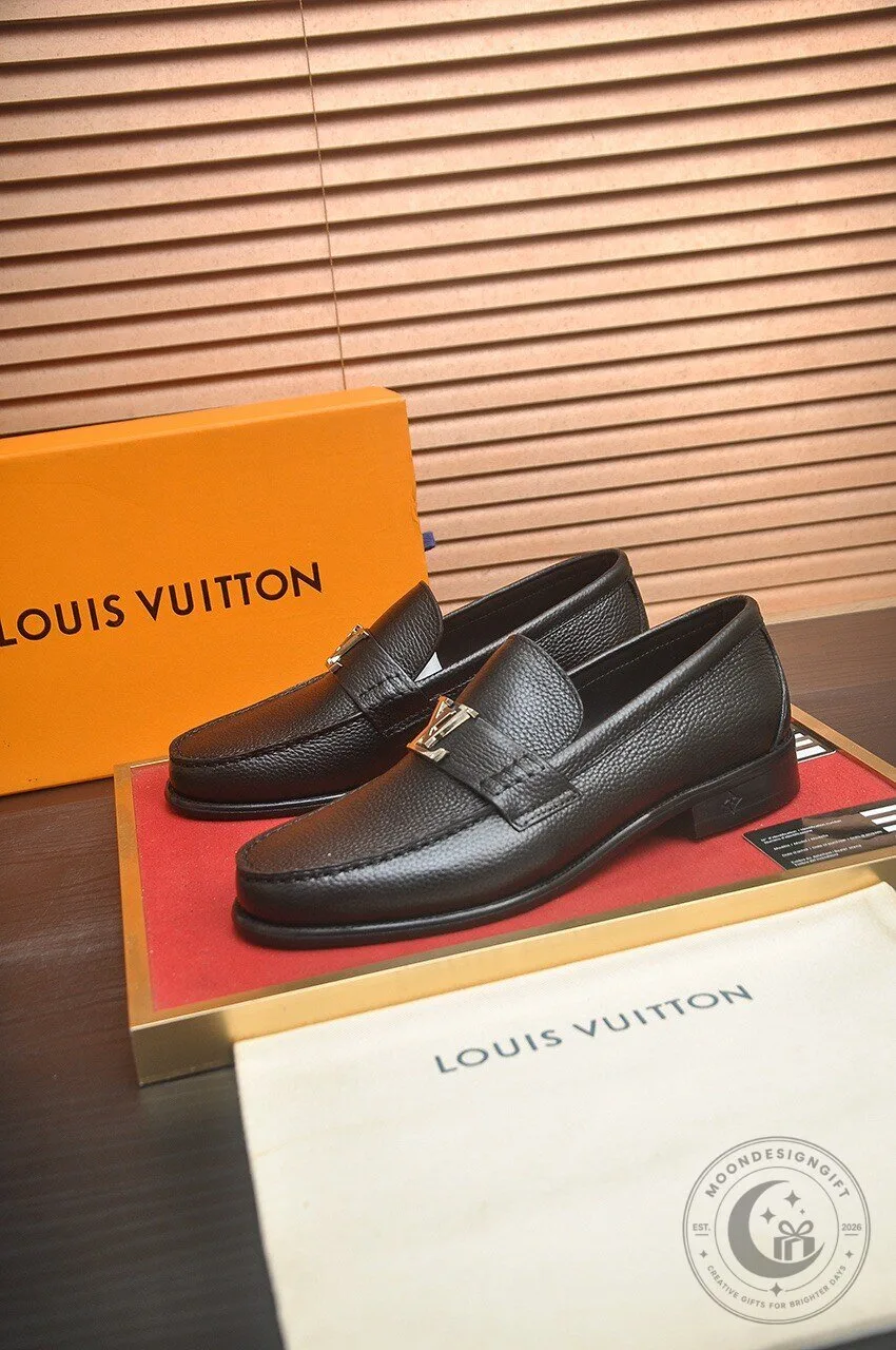 Black Leather Loafers by Louis Vuitton featuring a Gold LV Buckle